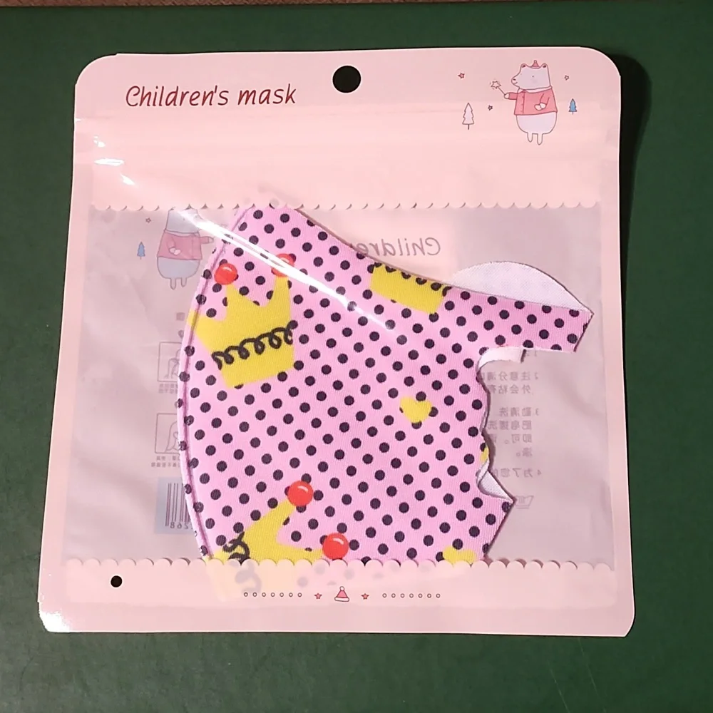 Children's re Usable face mask new in package never opened